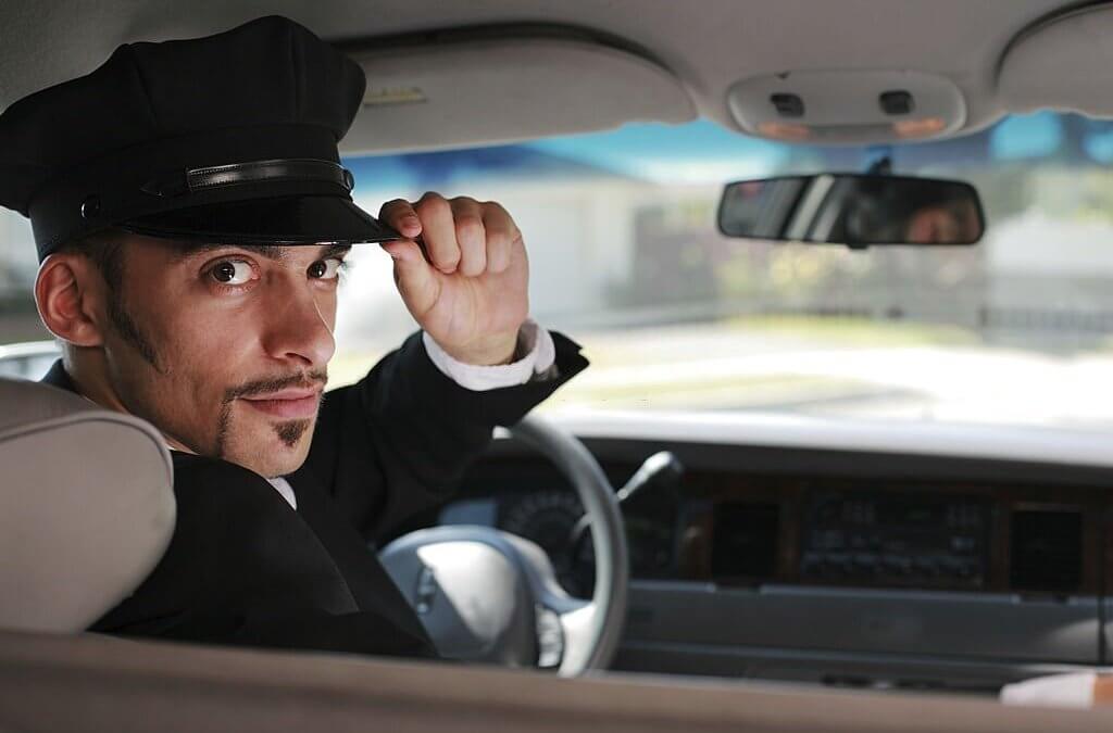 Experienced limousine driver behind the wheel, ready to provide a luxurious and safe journey.