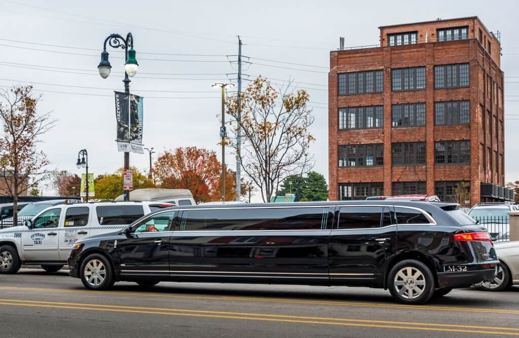 A sleek, black limousine waiting to transport you in style and comfort.