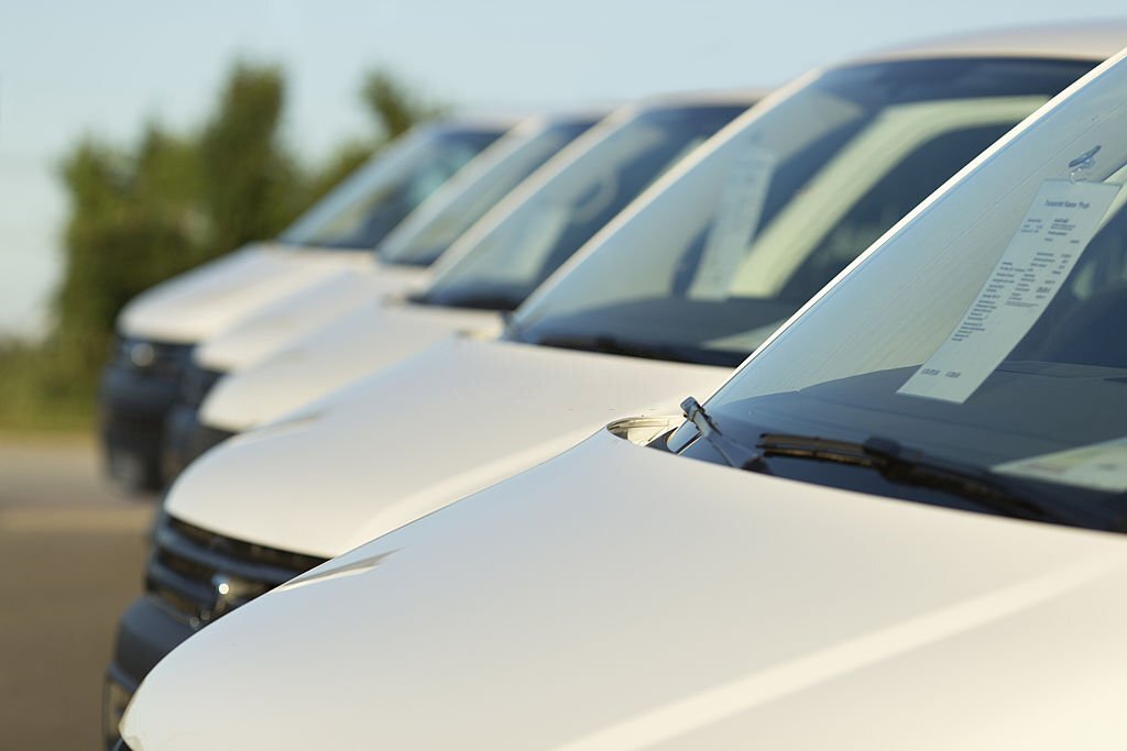 White limousine in a row in sunshine