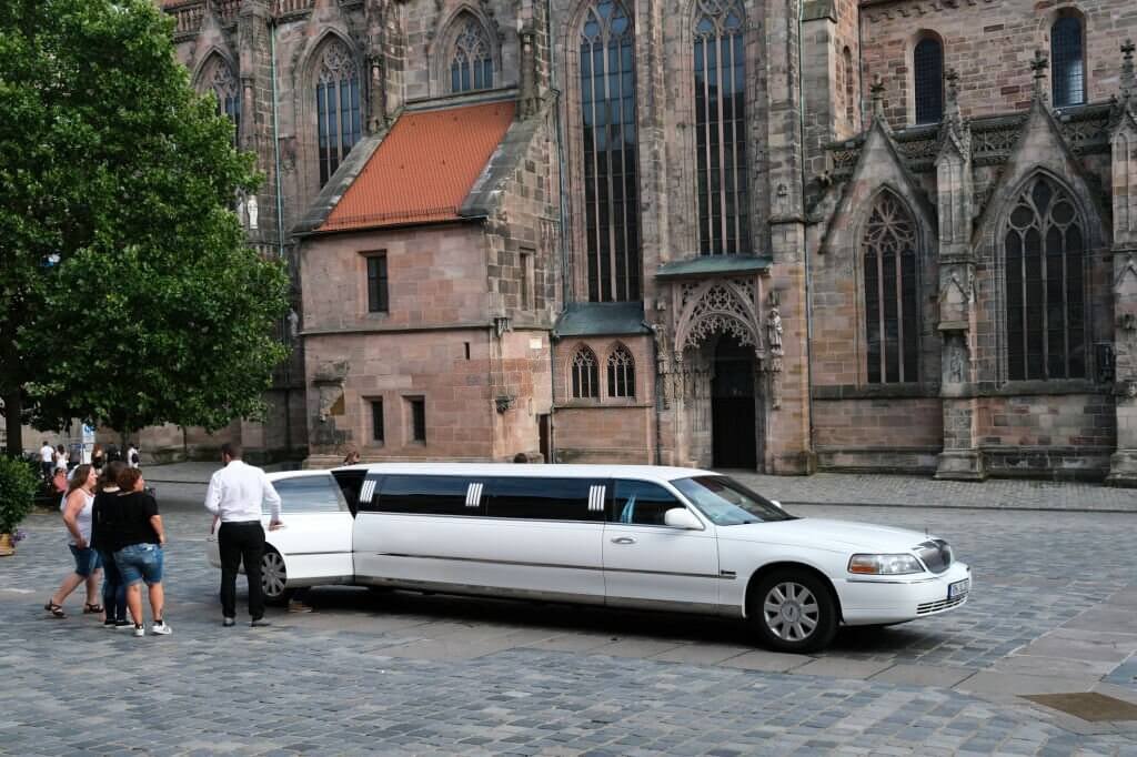 A luxury limousine car seen in central square 