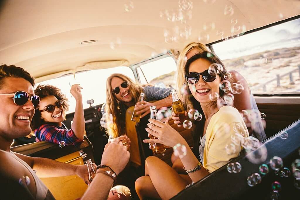 A group of friends inside a van .