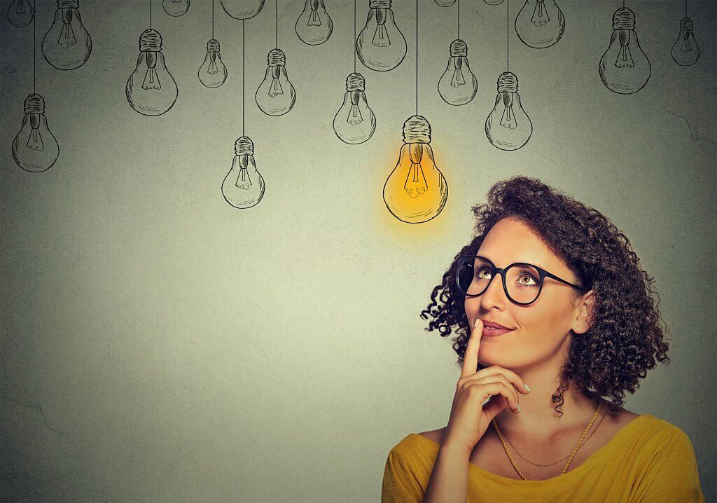 Portrait thinking woman in glasses 