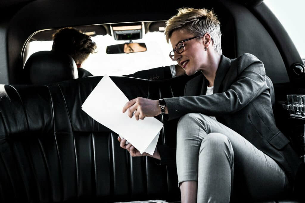 a businesswoman at a back seat